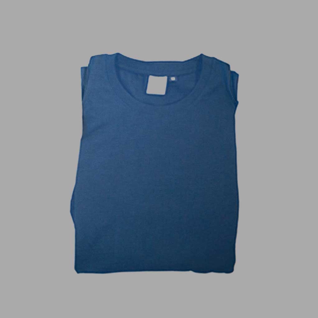product shot of the folded view of a light blue unisex t-shirt made from sustainable organic cotton and produced ethically paying a living wage.